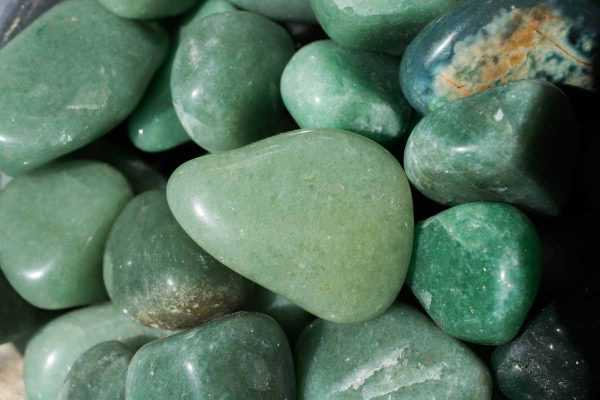 Light green stone shop with black specks