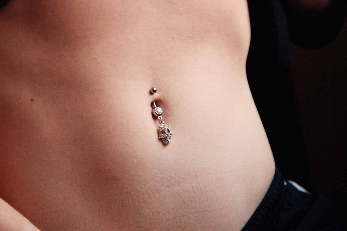 how to care for an infected belly piercing