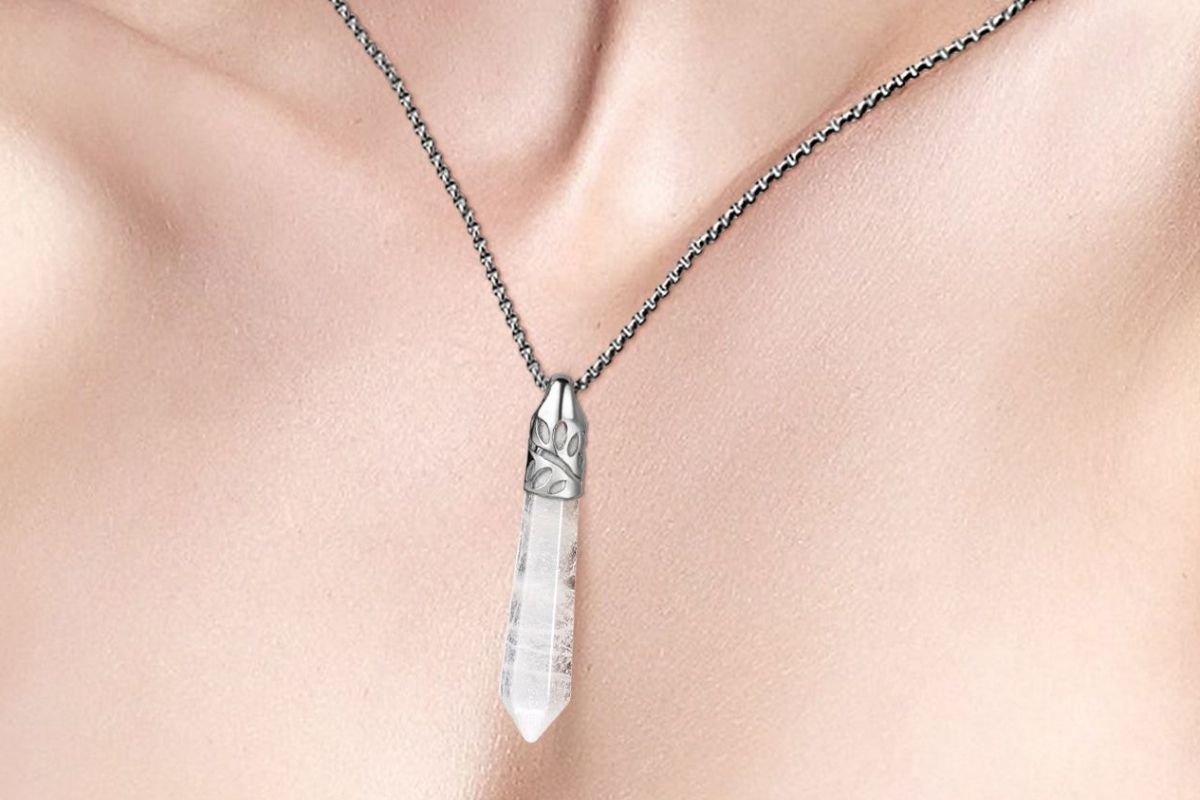 wearing clear quartz necklace